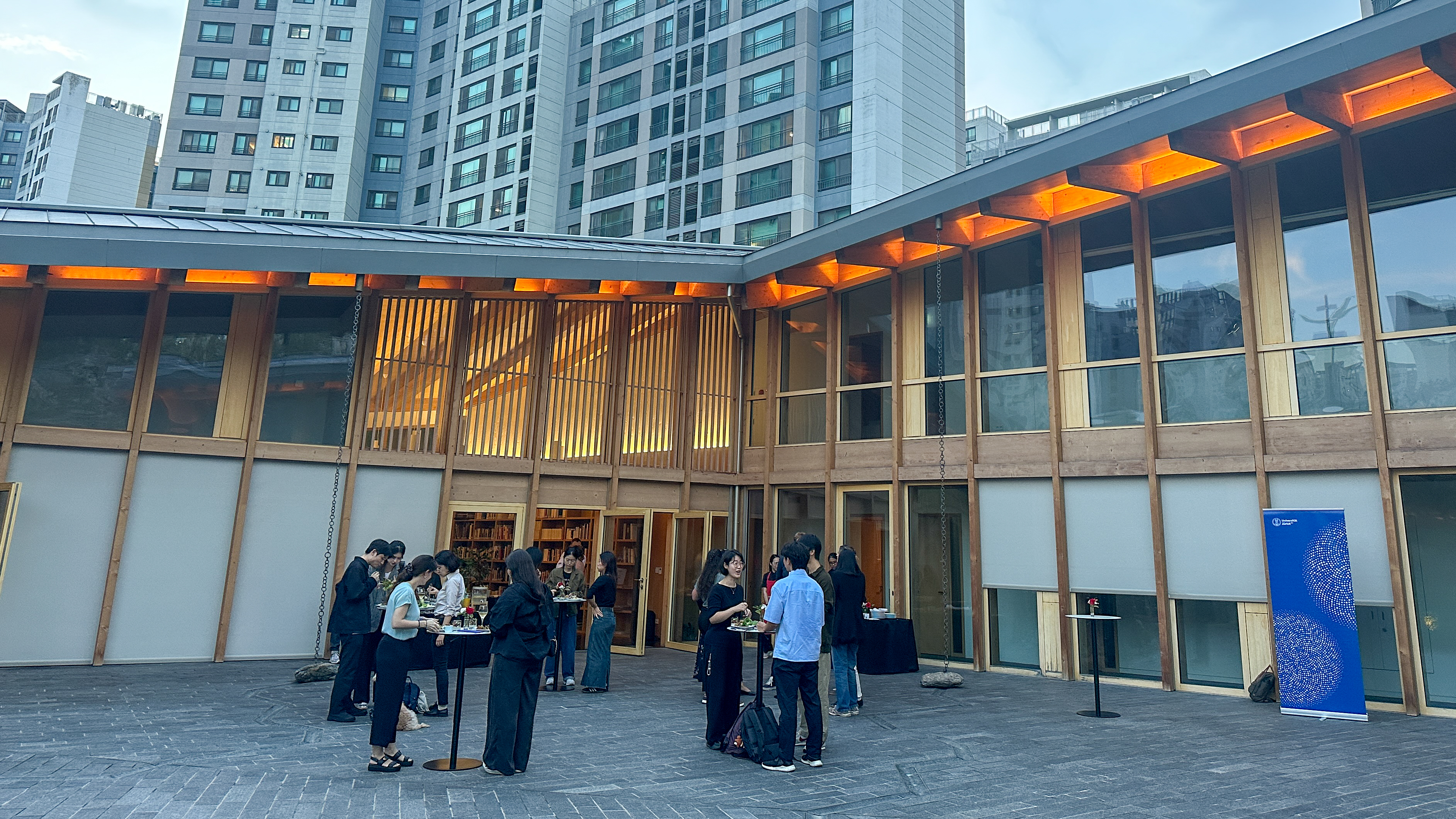 University of Zurich alumni gather outdoors during an event in Korea in September 2025